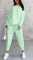 Full body view of mint green casual two-piece sweatshirt and pants set on model - Light Green