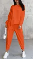 Two-piece orange lounge set featuring a loose irregular sweatshirt and matching pants. - S / Top And Bottom / Orange Red