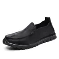 Men's casual black leather slip-on loafers with hand-stitched details and rubber sole - 38 / Slip-on / Black