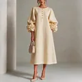 Detailansicht der französischen 3D-Blumenärmel an einem beigen Leinenkleid - Aprikose