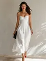Elegant white strappy maxi dress with ruched bodice details worn by a fashion model - S / Dresses / White