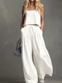 Vista dettagliata del set due pezzi in cotone lino bianco con canotta e pantaloni larghi. - Taglia S / Top e Pantaloni / Bianco