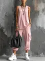 Vista de cuerpo completo de un top de punto rosa con pantalones cargo cortos chic - S / Top Y Pantalón / Rosa