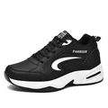 Men's black and white low-top running shoes with thick cushioned sole for outdoor winter sports - 39 / Black and White