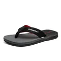Men's lightweight casual beach flip-flops with black woven strap and grey textured sole - 40 / Gray