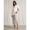 Elegante gonna longuette a vita alta con frange di paillettes argento per moda donna - Taglia S / Pantaloni e gonne / Bianco