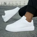 Detailed macro view of white fashion leather low-top sneakers with thick soles - 36 / Low Top Sneakers (LT116) / White