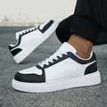 Close-up of black and white leather sneakers with thick ridged soles - 36 / Low Top Sneakers (LT116) / Black