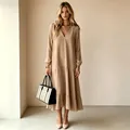 Elegant beige V-neck long-sleeve maxi dress with tiered hem shown in a full-length studio view. - 3XL / Dresses / Khaki