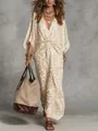 Zicht op een maxi-jurk met luipaardprint, V-hals, gouden sieraden en een grote tas - S / Top And Bottom / Abrikoos