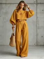 Mustard yellow two-piece set with puff sleeve cropped top and wide-leg trousers. - S / Top And Bottom / Orange