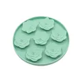 Mint green silicone slow feeder mat for dogs featuring textured floral licking patterns - Camellia Round Style / Green