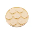 Soft floral-shaped silicone dog slow feeder lick mat in a matte cream yellow finish - Beige