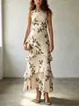 Dettaglio di un abito lungo floreale senza maniche con elegante gonna a balze a strati - XS / Vestiti / Bianco avorio