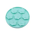 Turquoise silicone dog lick mat with rose flower pattern for slow feeding and anxiety relief - Cyan