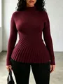 Close-up of burgundy ribbed knit high-neck sweater featuring slim-fit waist and texture - XS / Tops / Burgundy