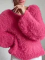 Detailed view of a bright pink fuzzy sweater showing soft fluffy texture and round neck design - S / Tops / Rose Red