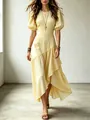 Detailed view of yellow lantern sleeve dress with tiered asymmetrical ruffled pleated hem - XS / Dresses / Light Yellow