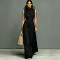 Elegant black sleeveless maxi dress with stand collar and front buttons detail. - XS / Dresses / Black