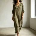 Detailed view showing the loose fit and texture of an olive green V-neck linen maxi dress - XS / Dresses / Army Green