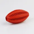 Giocattolo per cani in gomma rossa per pulizia dentale e dispenser di crocchette. - Palla da rugby / Grande Lunghezza 12cm / Rosso
