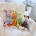 Lot de quatre jouets en peluche pour chiens avec couineur en velours côtelé résistant - Chien Brun / Marron