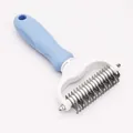 Professional double-sided pet dematting rake with an ergonomic light blue handle - OPP Packaging / Large 17+9 Teeth / Sky Blue
