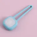 Safety LED pet pendant in light blue silicone with smiley face for night walking safety - Sky Blue
