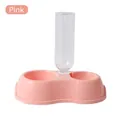 Pink pet feeder with automatic water bottle and double bowls for dogs and cats - Pet Water and Food Bowl (Pink)
