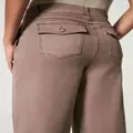 Braune Mikro-Schlaghose mit hoher Taille und Details an der hinteren Klappentasche - M / Unterteile / Braun/Verlängert