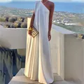 Elegant white one-shoulder sleeveless maxi dress with a flowing draped silhouette. - White