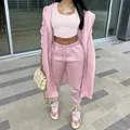 Full length view of stylish pink long hooded sweatshirt and sweatpants sports two-piece set - S / Top And Bottom / Pink