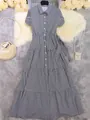 Full-length view of a black and white striped short sleeve shirt dress with tiered skirt - XL / Dresses / Black