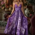 Detail view of an elegant purple floral printed maxi dress featuring a flowy skirt - S / Dresses / Purple