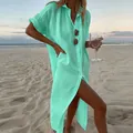 Mint green cotton linen midi shirt dress shown on a model in a scenic beach setting. - S / Tops / Light Green