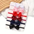 Set de 6 diademas elásticas para bebé en colores lisos con lazos de falla - Estilo B (Código)