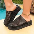 Stylish black woven mesh platform slippers for women featuring a closed-toe beach design - 35 / Black