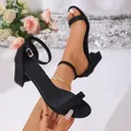 Detailed view of elegant black suede block heel sandals with an adjustable ankle strap - 35 / Black Style (021A)