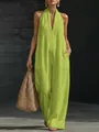 Detail shot of elegant lime green sleeveless halter wide-leg jumpsuit with pockets - S / Green