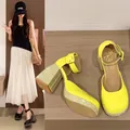 Detailed view of yellow patent leather Mary Jane shoes with rhinestone block heels. - 38 / Rhinestone Heel / Fluorescent Green