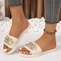 Detail of off-white quilted slides with rhinestone metal chain and platform sole - 36-37 / Off White