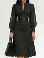 Detailed view of black denim dress featuring sheer lantern sleeves and a belted waist. - S / Black