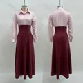 Dettaglio fronte e retro di un abito bordeaux a trapezio con top a righe e vita alta - Taglia S / Vestiti / A Righe Rosa e Rosso Vino