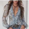 Elegant light blue snake print ruffled long sleeve blouse featuring a front zipper - S / Tops / Sky Blue