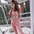 Pink loungewear set with sequined evil eye graphic top and pants - S / Top And Bottom / Pink