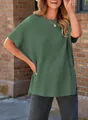 Detail of a casual green knitted short sleeve top with ribbed texture and crew neck - Green