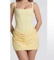 Detailansicht eines hellgelben, ärmellosen Korsett-Bodycon-Minikleids mit drapiertem Rock - Gelb