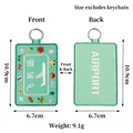 Double-sided mint green embroidered luggage tag with airport plane design and dimensions. - Mint Green (Airport)