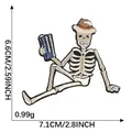 Embroidered cartoon skeleton patch with hat and blue book accessory, 2.8x2.59 inch size - Sitting Holding Object Skeleton / Single Piece (7.1x6.6)