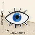 Blue and white eye embroidered iron-on patch measuring 4.8x4cm for DIY apparel decoration - Eye / 4.8x4cm